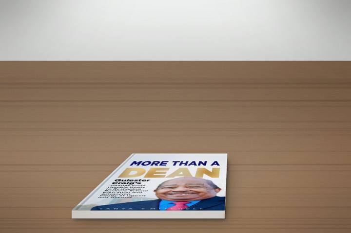 Paperback lying flat on a wooden desk
