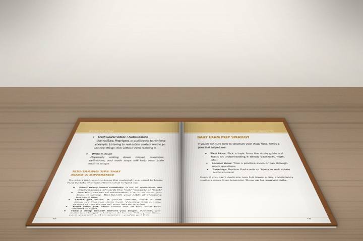 Open book lying flat on a wooden tabletop